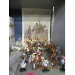 A collection of unpainted Del Prado lead figures, together with ten painted figures on horseback and