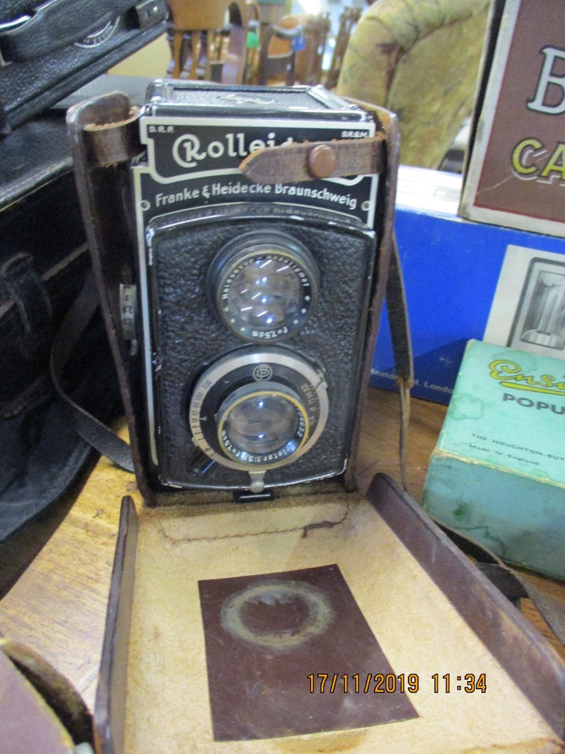 Vintage cameras and accessories to include Rolleicord, a cine Kodak, a box Brownie in original box - Image 2 of 3