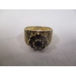 A 9ct gold garnet set ring, 6.2g