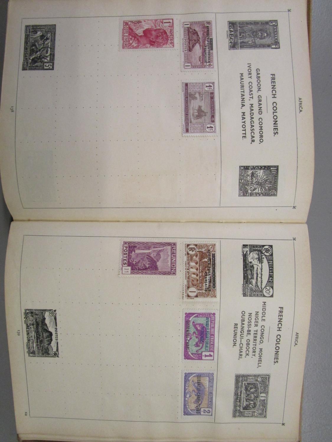 An early 20th century stamp album containing Victorian and early 20th century stamps from around the - Image 11 of 12