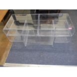 A John Lewis Perspex television stand, 17 7/8" x 40 3/8" x 15 6/8"