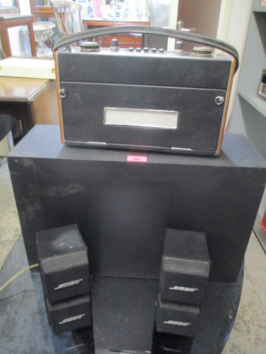 A Bose speaker system, together with a Roberts R707 radio