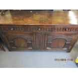 A reproduction oak linenfold dresser base 32" x 60" x 19 1/2"