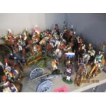 A collection of twenty six painted Del Prado lead figures on horseback, two canons and three lead
