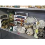 A mixed lot to include boxed collectable locomotives, collectors plates, silver thimbles, button