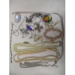 Mixed costume jewellery to include a silver necklace, butterfly brooch, cultured pearl necklace