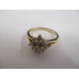 A 9ct gold diamond cluster ring, 2.4g