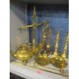 Brassware to include large scales, a kettle, a pair of candlesticks and fire irons