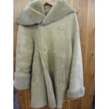 A late 20th century Maxfield Parrish blonde sheepskin hip-length coat size small 36"/38" chest (