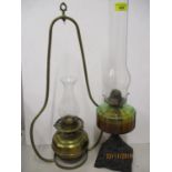 A Victorian brass hanging oil lamp (shade deficient), together with a Victorian oil lamp to