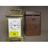 A five window brass carriage clock with key