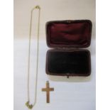 A 9ct gold cross and chain