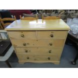 An early 20th century pine chest of five drawers raised on bracket feet 36"h x 39"w