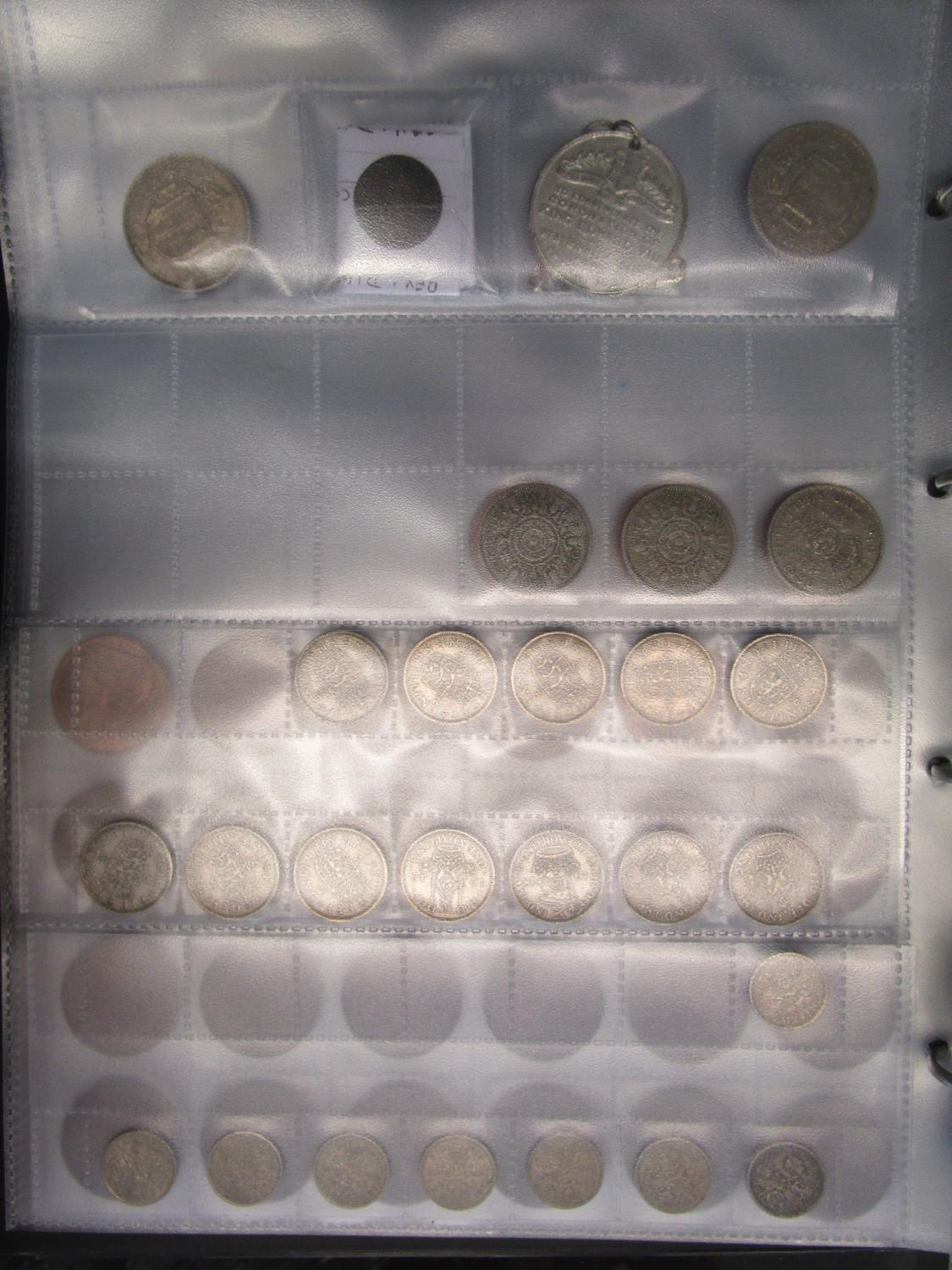 A coin collection of British and worldwide coins to include an 1858 half penny coin, Royal Air Force - Image 2 of 4