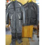 A Frank Thomas motorbike jacket in black, size XL, together with a Cycle Spirit motorbike all-in-one