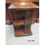 A reproduction mahogany swivel bookcase, 31" x 19 3/4" w A/F