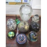 A selection of paperweights to include an Isle of Wight and others