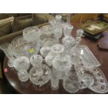 Glass to include cut glass bowls and covers, decanters, a basket, biscuit barrels and similar items