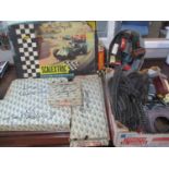 A boxed Scalextric and track, together with loose trains and accessories