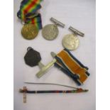 A WWI victory medal awarded to Captain F Jeeves and two WWII medals, ribbons and a Borough of