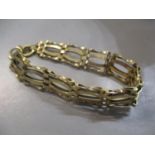 A 9ct gold gate link bracelet, 14.8g