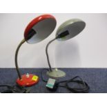 A mid 20th century Italian desk lamp in red with a brass adjustable arm and another similar in grey