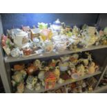 A collection of ceramic novelty teapots, Chinese enamel teapots and other items