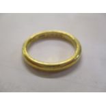 A 22ct gold wedding band, 5.5g