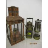 The Protector Lamp and Lighting Co Ltd, miners lamp and one other together with a copper cased oil