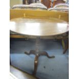 A part Georgian mahogany pedestal occasional table, circular top on turned column and splayed feet