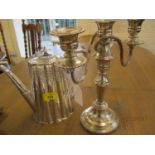 A silver plated coffee pot and candelabra