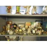 A group of dressing table and mantle clocks, ornaments and reference books on clocks