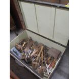 A vintage twin handled painted trunk containing mixed tools