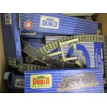 A selection of boxed Hornby Dublo items to include a tank locomotive, control unit and mixed
