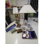 A mixed lot to include table lamps, a Japanese porcelain part coffee set, photo frames and other