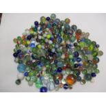A quantity of Victorian and later glass marbles and small steel balls