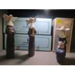 A group of three boxed Lladro porcelain figures depicting nuns