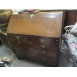 A George III oak bureau with two short and three long drawers, on bracket feet, 39"h x 36"w