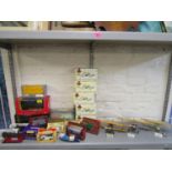 A selection of boxed collectors diecast model vehicles and three scale models of a Boeing P-12E,