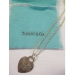 A Tiffany silver necklace with heart shaped pendant