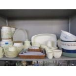 Hornsea Fleur kitchen canisters with wooden lids and mixed kitchenware