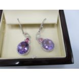 A pair of Tivon 18ct white gold pendant earrings set with amethysts, approximately 13.00ct, diamonds
