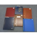 Six stamp albums containing GB, Chinese and world stamps