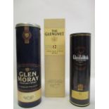 A 70cl bottle of Glenlivet Single Malt Scotch Whisky, a 35cl bottle of Glenfiddich Special Reserve