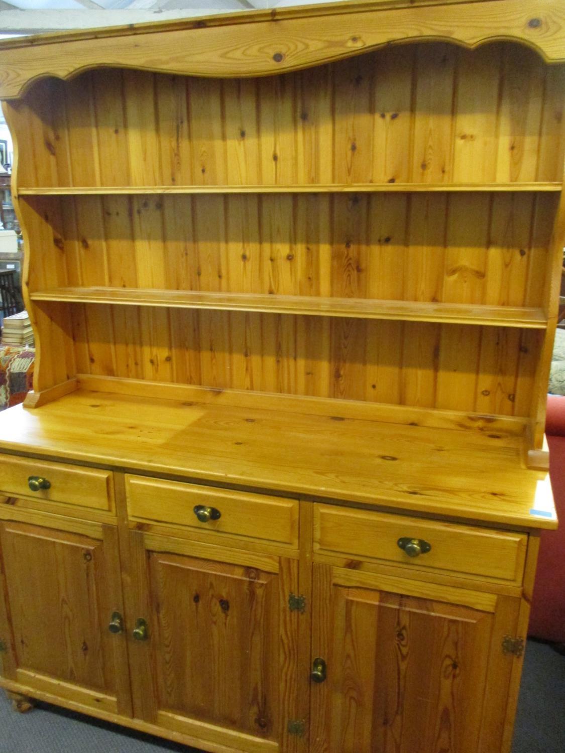 A late 20th century pine dresser, 68" x 54" x 18"