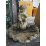 A reconstituted stoneware garden bird bath in the form of a fawn sitting on top of a shell, 19 1/2"h