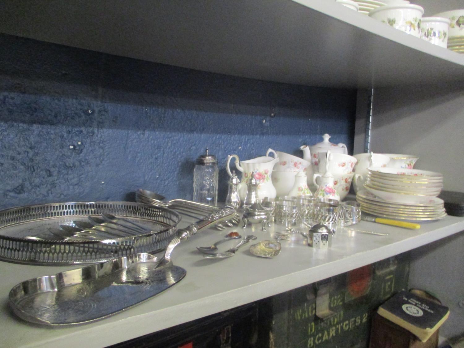 Silver plate to include a crumb scoop, soup spoons, condiments and other items, along with a teaset