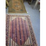 A Persian carpet and one other