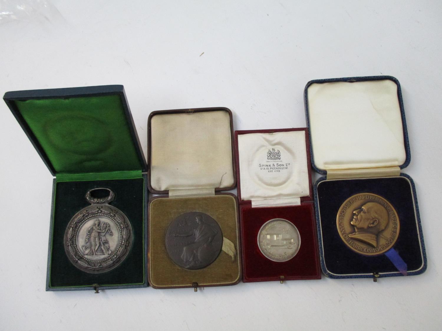 Medals and medallions to include an LMSR General Strike medal 1926 by E Gillick in bronze case,