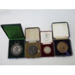 Medals and medallions to include an LMSR General Strike medal 1926 by E Gillick in bronze case,